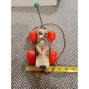 Vintage 1965 Fisher Price Little Snoopy Wood Pull Toy Dog with Shoe